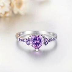 A Beautiful Heart Shaped Purple Zircon Ring With Small Purple Zircon On The Sides Of The Heart Stone. Size 7 Amethyst Birthstone Ring, Amethyst Birthstone, Rhinestone Ring, Zircon Ring, Crystal Ring, Purple Crystals, Love Ring, Pretty Jewellery, Crystal Rings