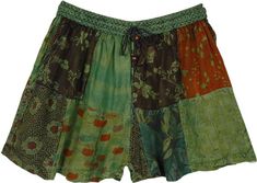 Style goes hand-in-hand with comfort with these multi-pattern handmade rayon shorts! With an elastic drawstring waist, you can adjust the size according to your comfort; The material is soft stonewashed cambric. The comfy lounge shorts have a complimenting patchwork pattern on top and two pockets for storing essentials. #tlb #Patchwork #Stonewash #Pocket #vacationclothing #Fall #bohemianfashion #bohoshorts #TeenagerShorts Bohemian Green Short Bottoms, Green Patchwork Bottoms For Vacation, Green Bohemian Shorts For Summer, Bohemian Green Shorts For Beach, Summer Green Shorts With Patchwork, Green Hippie Festival Shorts, Hippie Green Festival Shorts, Green Summer Festival Shorts, Bohemian Green Shorts For Vacation