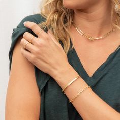 Stay stacked! Two perfectly paired bracelets instantly elevate any outfit. Product Details Parker Bracelet Total length 7 1/4" Links measure 3/8" by 1/8" Hinge closure measures 1/2" Available in 18k gold plated brass Avoid contact with anything containing derivatives of alcohol Venice Bracelet 6 1/4" chain + 1" extender Total length 7 1/4" 3/16" wide chain Lobster closure Available in 18k gold plated brass Avoid contact with anything containing derivatives of alcohol | Go To Bracelet Set in Gold Modern Paperclip Bangle Bracelet For Everyday, Modern Stackable Gold Bracelet For Everyday, Modern Stackable Jewelry With Rectangular Links, Elegant Everyday Paperclip Bracelet With Spring Ring Clasp, Modern Stackable Gold Bracelet, Modern Gold Bracelet With Rectangular Links For Everyday, Modern Gold Bracelet With Rectangular Links, Classic Bangle Bracelet, Elegant Gold Paperclip Bracelet