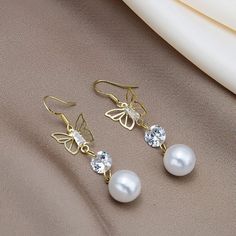 This Unique Pair Is A Wonderful Addition To Your Wardrobe And Your Style; Sure To Get Lots Of Compliments! Gsumd8002000wa3 White Metal Crystal Earrings For Party, Party White Crystal Metal Earrings, White Crystal Metal Earrings For Formal Events, White Metal Crystal Earrings For Formal Occasions, White Pearl Earrings With Rhinestones For Party, Skull Fire, Boho Drop Earrings, Pearl Butterfly, Ankle Chain