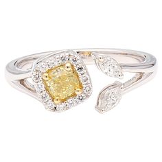 a yellow and white diamond ring