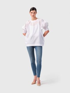 Discover the perfect blend of comfort and style with our relaxed fit blouse "Ildiko" made of 100% cotton, featuring elastic cuffs at the sleeve ends for a comfortable fit and individual adjustment, ensuring all-day comfort, suitable for any occasion, and produced in Europe under sustainable conditions for the ´Helene Galwas´ fashion label. Made of 100% Cotton. Handwash only. Cotton Tops With Cuffed Sleeves For Fall, Fall Cotton Tops With Cuffed Sleeves, Relaxed Fit Puff Sleeve Tops For Casual Gatherings, Stretch Cotton Tops For Daywear, Spring Cotton Top With Gathered Sleeves, Everyday Relaxed Fit Cotton Blouse, Spring Relaxed Fit Tops With Cuffed Sleeves, Relaxed Fit Cotton Blouse For Everyday, Spring Cotton Puff Sleeve Top For Workwear