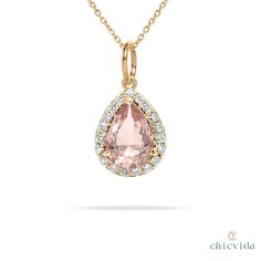 "Here's Pear Shape Morganite Halo Pendant, skillfully crafted in 14k/18k Solid Gold to showcase the natural charm of Pink morganite. This pendant is perfect for any event. Enjoy the simplicity and beauty of this easy-to-wear jewelry piece." Pink Morganite Pendant,Teardrop Morganite Necklace,14k Solid Gold Halo Necklace,Minimalist Pendant for Women,Statement Jewelry Gift for Her ★ ★ ★ ★  CUSTOM/DUTY-FREE SHIPPING WORLDWIDE, BUYERS DON'T HAVE TO PAY ANY CUSTOM FEES WHILE IMPORTING ★ ★ ★ ★  Details Made to order Material: 14k/18k gold Color Options: Yellow Gold, White Gold, Rose Gold ★ Center Stone Natural Pink Morganite, Pear Size: 5 x 7 mm  Approx Weight (Ct): 0.60 ★ Accent Stones Diamond/Moissanite Round Size: 1.1 mm * 33 Nos.   Approx Weight (Ct): 0.20 ★ Ring Height: 9.5 mm ★ Band Width: Teardrop Fine Jewelry Necklace With Halo Setting, Fine Jewelry Teardrop Necklace With Halo Setting, Teardrop Halo Setting Necklace As Gift, Teardrop Necklace With Halo Setting As Gift, Wedding Pear-shaped Necklace With Halo Setting, Pear-shaped Necklace With Halo Setting For Wedding, 14k Gold Pear-shaped Gemstone Necklace, Yellow Gold Teardrop Gemstone Drop Necklace, Yellow Gold Pear-shaped Gemstone Drop Necklace