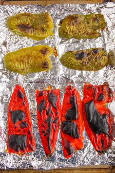 the peppers are on tin foil and ready to be cooked