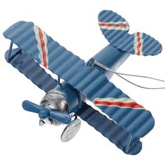 a blue toy airplane with red, white and blue stripes on it's wings