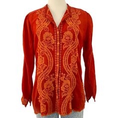 - Red-Orange Blouse With Burnt Orange Embroidery - Button Down - Long Sleeves - Semi-Sheer - Relaxed Fit - 100% Cupra Rayon - In Excellent Pre-Loved Condition - Size: S - Armpit To Armpit: ~ 21” - Length From Shoulder To Hem: ~ 27” Fast Shipping! Long Sleeve Orange Top With Floral Embroidery, Orange Long Sleeve Blouse With Floral Embroidery, Orange Floral Embroidered Long Sleeve Top, Red Embroidered Long Sleeve Shirt, Red Bohemian Blouse With Buttons, Traditional Embroidered Button-up Blouse, Traditional Red Blouse For Fall, Orange Blouse With Floral Embroidery, Red Long Sleeve Blouse With Chikankari Embroidery