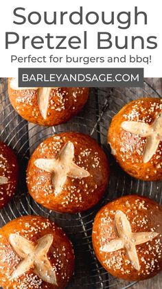 some food is on a wire rack with the words, sourdough pretzel buns perfect for burgers and bbq