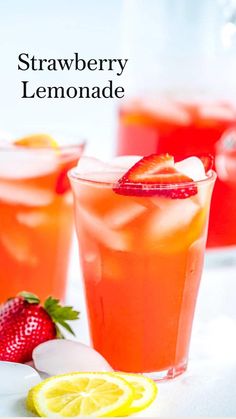 strawberry lemonade in glasses with strawberries and lemons on the rim text overlay reads strawberry lemonade