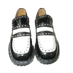 What you are looking at is a rare pair of Vintage 1990s Gripfast Men's Black and White Patent Leather Slip On Loafer Shoes. . Made by Gripfast in England. Will fit men's U.S. size 8 or a women's US size 9. The inside foot bed measures 10.00 inches from the heel to the toe. The outside sole measures 11.00 inches long and 4 inches wide. The heel is 1 1/2 inch tall. In very good condition. Mens Loafers, Leather Slip Ons, Mary Jane Sneaker, Loafer Shoes, Mens Fitness, Loafers Men, Patent Leather, Shoes Mens, Men's Shoes