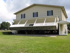 a large house with a car attached to it