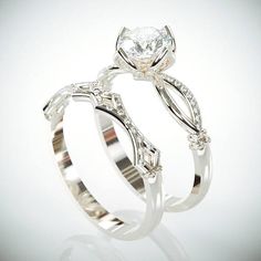 two white gold wedding rings with diamond accents