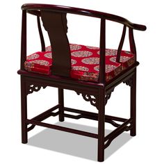 a wooden chair with a red cushion on it's back and armrests