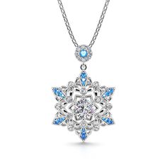 Calm, regal, and reserved, the mysterious beauty of this snowflake inspired necklace will leave you in awe. This snowflake necklace captures the beauty and intricacy of a snowflake gently falling from the sky during a winter snow. It designed is full of detailing, finished with sparkling blue sapphire stones to make it really shine on your neck. The glorious sparkle will turn heads and catch eyes. Give as a gift to someone at Christmas or treat yourself to remind you of this special time of year Blue Snowflake Sterling Silver Necklace, Winter Snowflake Necklace, Elegant Christmas Snowflake Necklace, Jeulia Jewelry, Snowflake Jewelry, Snow Princess, Snowflake Necklace, Classic Necklace, Silver Jewellery Sets