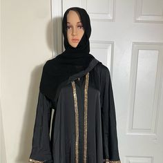 Black: Size 54, 56, 58. Lavender Grey: 58. Light Green: 58 Modest Black Kaftan For Eid, Black Long Sleeve Khimar With Dabka, Long Black Abaya For Eid, Evening Black Abaya With Dabka, Black Abaya With Dabka For Eid, Black Dabka Abaya For Eid, Black Long Sleeve Kaftan For Wedding, Elegant Long Black Niqab, Black Long Abaya With Dabka Detailing