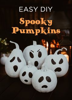 halloween pumpkins with faces painted on them and the words easy diy spooky pumpkins