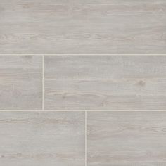 a white tile floor with grey wood grains on the top and bottom half of it