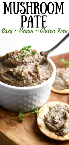 a bowl of mushroom pate with crackers on the side