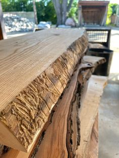 a close up of a piece of wood that has been cut in half and is sitting on a table