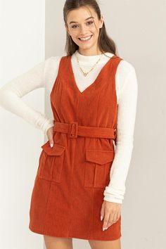 Corduroy belted mini dress. Features: Chic v-neckline Sleeveless bodice Front-flap pockets Matching buckled waist belt Fabric: 100% Polyester HF23F646 Thanksgiving Ootd, Girls Accesories, Tiny Closet, Plus Jumpsuit, Corduroy Dress, Corduroy Fabric, Maternity Shops, Ribbed Dresses, Plus Dresses