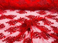 an intricately detailed red piece of cloth