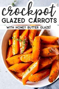 a white bowl filled with cooked carrots on top of a blue table cloth and text overlay reads, crockpot glazed carrots with honey butter glaze