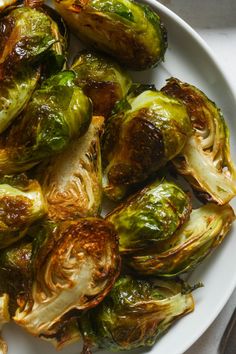 brussel sprouts on a white plate ready to be eaten