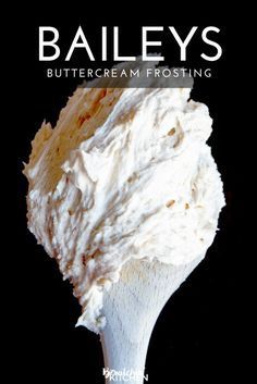 the cover of bailey's buttercream frosting, with a spoon full of whipped cream