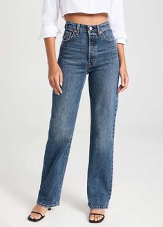 Levi's® highest high rise yet. The Ribcage Jean—with its soaring 12-inch rise—has become a hip-slimming, waist-defining, leg-lengthening obsession. This fit will show off your figure and make you feel as amazing as you look.Slim through your hip and thigh.Super high rise: 12.125".Straight leg. Button fly.99% cotton, 1% elastane.Heavyweight denim, stretch. Model is wearing a size 26. Levi's 501 Women Wide Leg, Gap Slim Boyfriend Jeans, Womens Baggy Jeans Levi's®, Cheap Relaxed Fit Button-up Jeans, Cheap Mid-rise Levi's Bottoms, Straight Leg Jeans Old Navy, Cheap Boyfriend Fit Medium Wash Flare Jeans, Affordable Medium Wash High Rise Jeans, Affordable Gap Jeans With Five Pockets