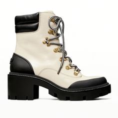 Tory Burch Lug Sole Hiker Ankle Boot In New Ivory/ Perfect Black Size 7 Waxy Cow Leather/ Nappa Leather In Very Good Preowned Condition. There's Slight Creasing Which Is Normal For Preowned Shoes But Overall It Looks Great. It Could Have Been Worn Once Or Twice. The Bottom Sole Looks Excellent. Ships Fast. Let Me Know If You Have Any Questions! Lug Sole, Tory Burch Shoes, Nappa Leather, Lace Up Boots, Black Cream, Cow Leather, Shoe Laces, Tory Burch, Looks Great