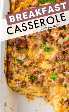 breakfast casserole with sausage and cheese in a white baking dish on a wooden table