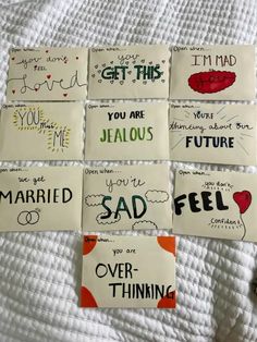 six handmade cards with words and phrases on them, all written in different languages