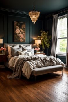 a bedroom with dark green walls and wooden floors