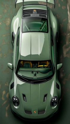 an overhead view of a green sports car