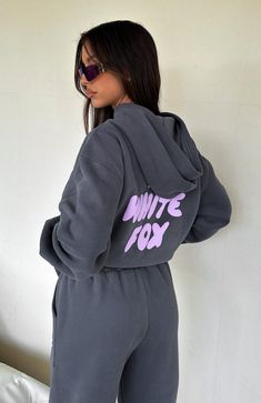 If your aesthetic is comfy but cool you will love the Offstage Hoodie in Volcanic. This hoodie is an oversized fit and features elasticated ribbed cuffs & hem, hood, soft fleeced fabric for extra comfort and a puff print logo centre front. Complete the tracksuit set with the matching Offstage sweatpants for the per Sweat Matching Set, Purple White Fox Hoodie, White Fox Vol 3 Hoodie, Cute Fluffy Hoodies, White Fox Hoodie Grey, White Fox Hoodie Outfit Ideas, White Fox Tracksuit Set, White Fox Hoodie Pink, White Fox Clothes