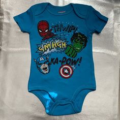 Blue Onesie Of Marvel Superheroes Hulk, Spider-Man, And Captain America. 60% Cotton And 40% Polyester. Brand New. Never Been Worn. Hulk Superhero, Marvel Shirt, Marvel Superheroes, Hulk, Captain America, Shower Ideas, Kids Shirts, Marvel Comics, Onesies