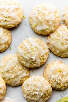 lemon cookies with white icing and sprinkles