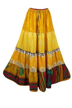 Embrace your free-spirited side with our Boho Chic Maxi Skirt, designed for the modern soul who loves to blend Golden Yellow , Floral comfort and style. This flowing, maxi-length skirt features vintage-inspired tribal prints and earthy tones, perfect for creating a laid-back yet hippie-style look. Handcrafted with care, the skirt boasts tiered layers and subtle, giving it a graceful, gypsy flair. Whether you're strolling on the beach or attending a festival, this relaxed-fit statement skirt will flow effortlessly with every step. Made from upcycled fabrics, it’s an eco-conscious addition to your wardrobe, combining sustainability with timeless style. Pair it with your favorite sandals or boots for an easy, ethnic-inspired ensemble that radiates bohemian elegance. Fabric:- silk blend with p Chic Maxi Skirt, Skirt Patchwork, Beach Maxi Skirt, Statement Skirt, Boho Skirts, Fabric Silk, Free Spirited, Eco Conscious, Golden Yellow