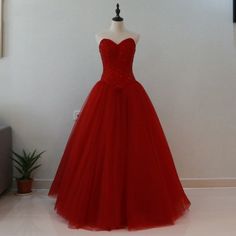 This Dress is fashionable for every occasion. the dress is made-to-order by professional tailors. You can choose from 50 colors, Regular sizes 2 to 16 and plus sizes 14w to 26W. Custom size is also available.. The product details: Color: Burgundy, Silhouette: Ball Gown, Neckline: Strapless, Waistline: Natural Waist, Length: Long, Primary Fabric: Tulle Elegant Sleeveless Quinceanera Dress For Debutante Ball, Embellished Quinceanera Dress For Banquet During Prom Season, Elegant Sleeveless Tulle Quinceanera Dress, Embellished Quinceanera Dress With Sweetheart Neckline For Evening, Formal Tulle Quinceanera Ball Gown Dress, Formal Tulle Quinceanera Ball Gown, Elegant Embellished Quinceanera Dress For Prom Season, Elegant Embellished Prom Dress, Formal Quinceanera Tulle Ball Gown