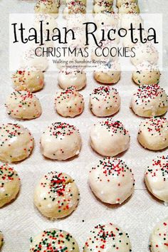 italian ricotta christmas cookies with white frosting and sprinkles