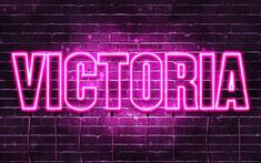 the word victoria written in neon pink on a dark brick wall with lightening effects