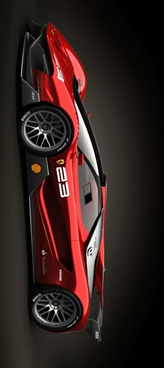 a red sports car is shown from above