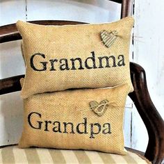 two pillows that say grandma and grandpa on them