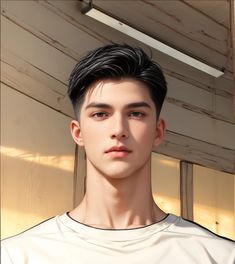 a young man with black hair and a white t - shirt looking at the camera