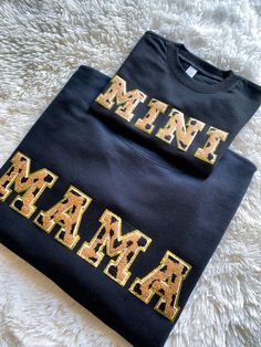 "Black Tan Gold Cheetah Print Glitter Chenille Letter Patch Mama Mini Matching Crewneck Sweatshirt Mother's Day Baby Shower New Mom Gift ✨ MIDWEST MODISH CO.  Thank you for considering a purchase from my shop! Please read the description to ensure your satisfaction prior to your purchase. For any questions, concerns, or custom order requests please message me & I will get back to you ASAP! ✨PRODUCT DETAILS -Gildan Unisex Brand - Adult Heavy Blend 8 oz Fleece Crewneck -50% cotton 50% polyester  - Black Glitter Long Sleeve Top, Black Cotton Top With Glitter Print, Gold Tops With Letter Print For Gifts, Gold Crew Neck Top As Gift, Matching Crewneck, Patches Shirt, Diy Sweatshirt, New Mom Gift, Mommy And Me Outfits