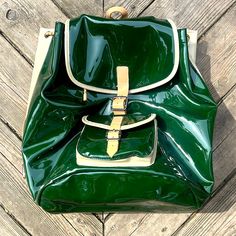 Green And Cream Patent Leather. Leather Back And Straps And Pockets On Side Great Backpack With Drawstring, Brown Leather And Pu, Adjustable Straps. Polyester Lining Very Roomy Smoke Free Environment Brand New In Original Box Trendy Pouch Backpack For Travel, Trendy Travel Backpack With Pouch Shape, Trendy Travel Backpack With Pouch, Trendy Green Standard Backpack, Green Leather Backpack With Zipper Closure For School, Trendy Rectangular Leather Backpack For Errands, Trendy Green Leather Backpack For School, Coated Canvas Backpack With Large Capacity, Trendy Green Leather Backpack For Travel