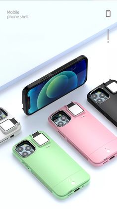 four different colors of cell phones with one charging device and the other in its case