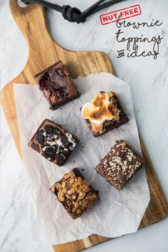 chocolate brownies with crumbled toppings on a cutting board