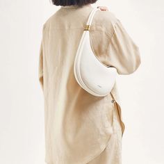 Luna Bag | Recycled Leather Curved Shoulder Bag | Songmont Luna Bag, Eco Friendly Handbags, Eco Chic, Recycled Leather, One Bag, Matte Gold, Cowhide Leather, Bag Making, Bucket Bag