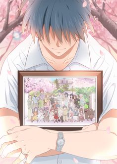 an anime character holding up a framed photo