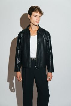 A vintage inspired vegan leather blouson. Our modern interpretation of a wardrobe classic that is both effortlessly cool & elegantly refined. Regular-fit with a slight crop to taper into the waist. Crafted from a buttery smooth, vegan leather that looks and feels like the real thing.